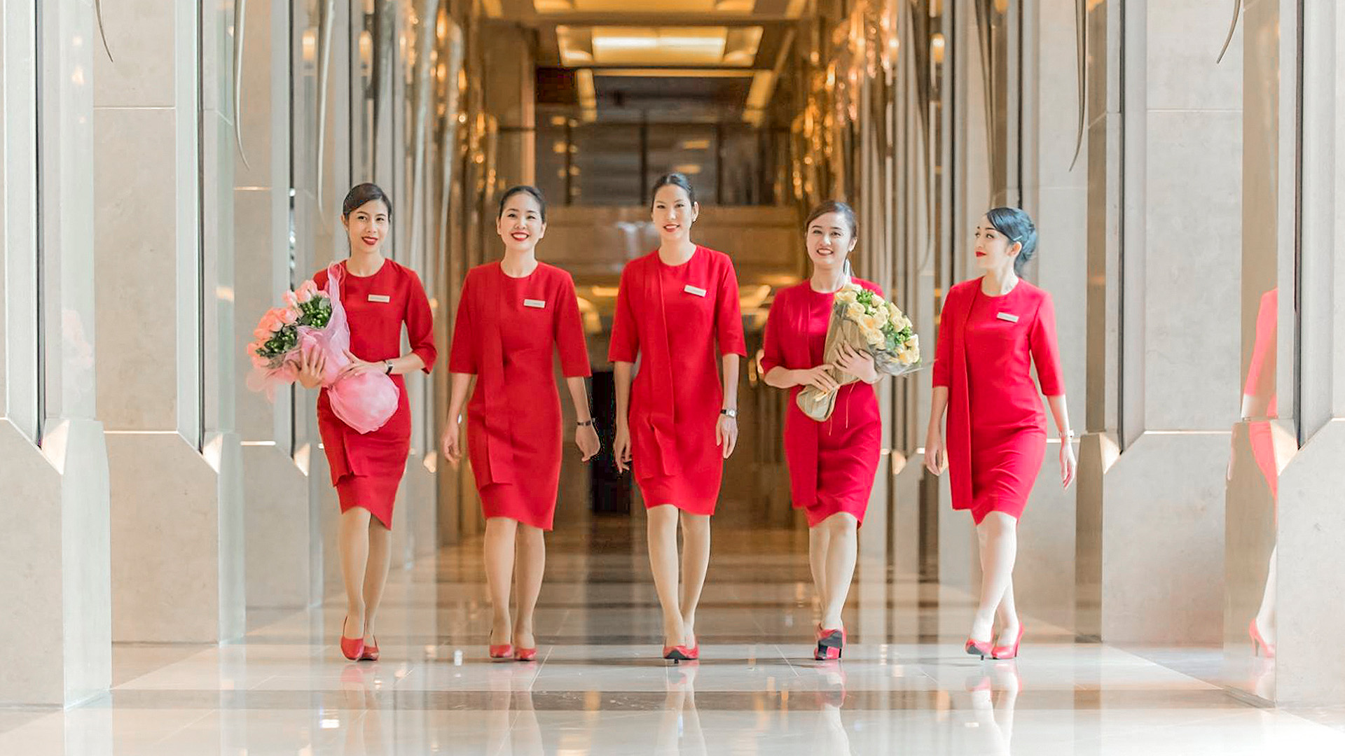 AboutUs_LadiesInRed_BKK1_1920x1080px.jpg